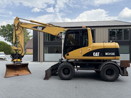Caterpillar M313C mobiele kraan 